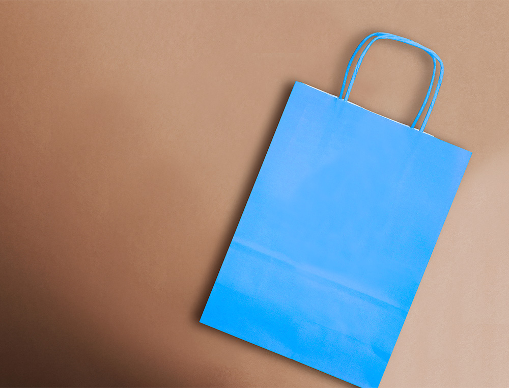 BOLSA PAPEL Q-CONNECT CELULOSA CELESTE S CON ASA RETORCIDA 240X320X10 MM