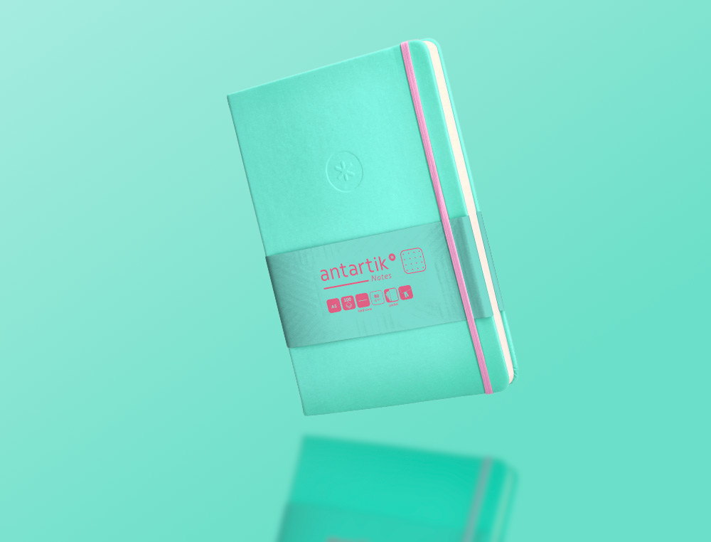 CUADERNO CON GOMILLA ANTARTIK NOTES TAPA DURA A5 HOJAS PUNTOS ROSA Y TURQUESA 100 HOJAS 80 GR FSC